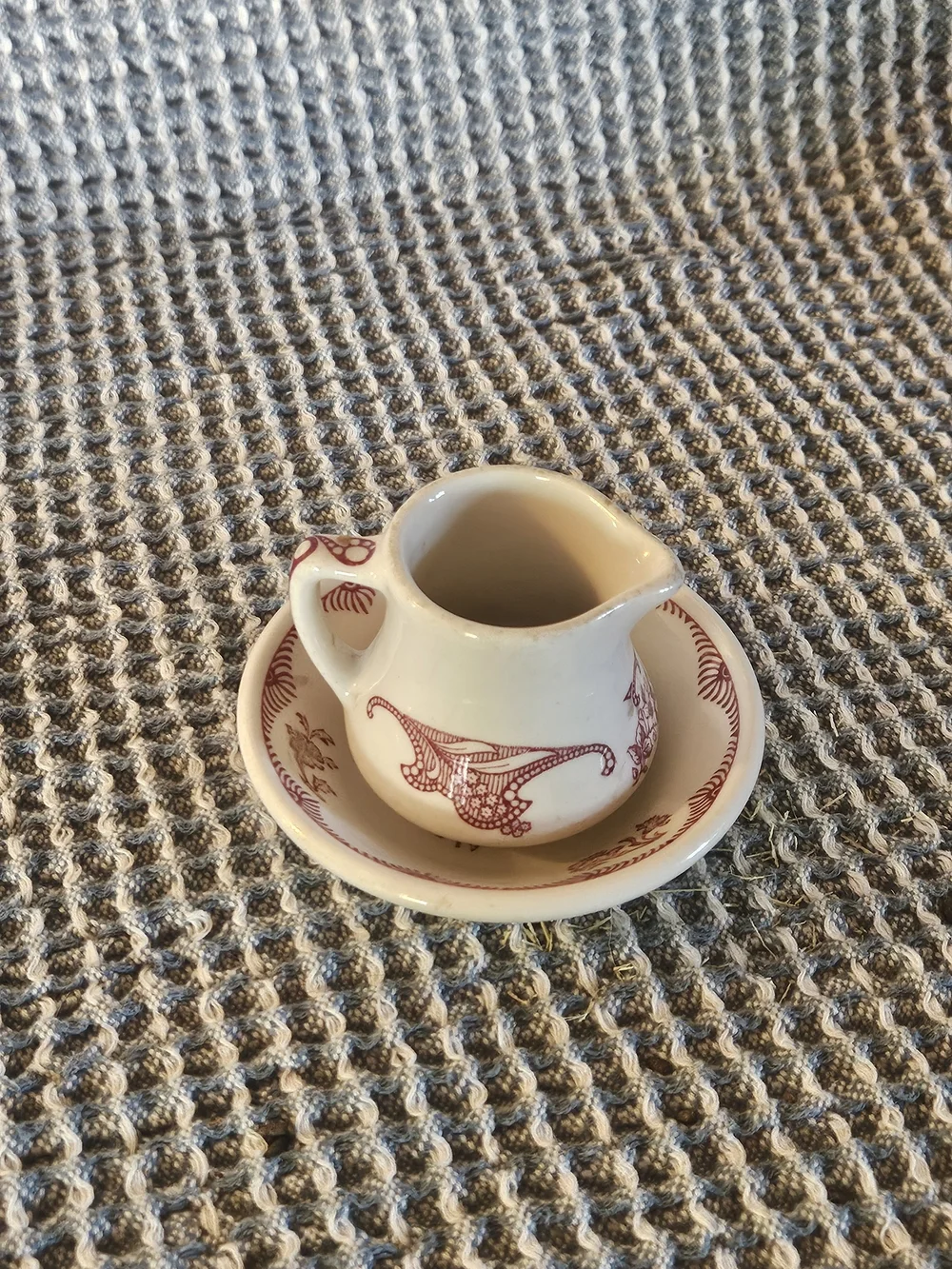 Cream Ceramic Mini Pitcher with Red Filigree Accent